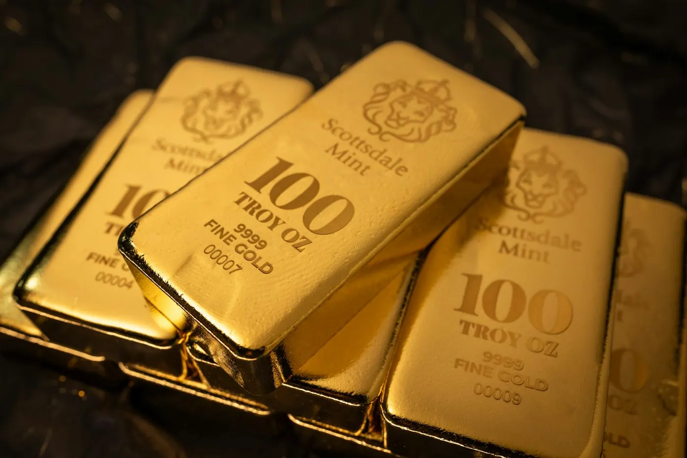 The stamped face of a 999.9 fine gold bar